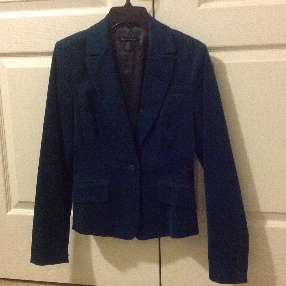 Dark blue blazer or suit jacket with green tint